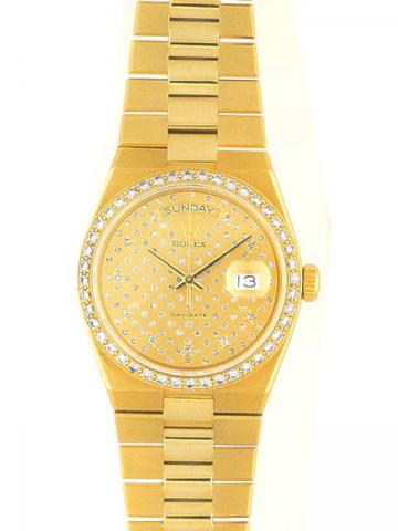 Rolex, Day-Date, Ref. 19000. Produced in the 1990's..Fine tonneau-shaped, center-seconds, water-resistant, 18K yellow gold and diamonds gentleman's quartz wristwatch with day/date and an 18K polished and brushed yellow gold integrated bracelet.