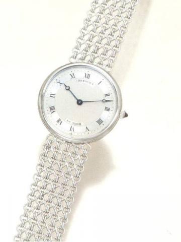 Breguet, No. 3968, Ref. 3150. Produced in the 1980's..Very fine, 18K white gold mid-size wristwatch, with Breguet 18K white gold four strand chain mail bracelet and clasp.