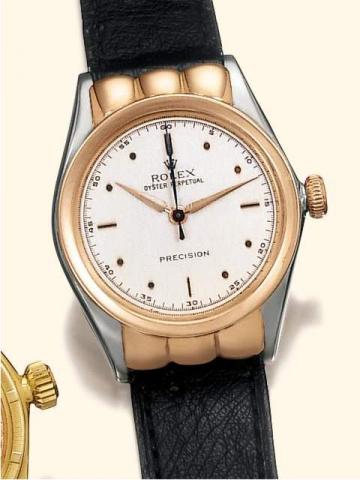 Rolex Oyster Perpetual, Rigid Hooded, Ref. 3951. Produced in the 1930's.Fine and rare, center-seconds, self-winding, water-resistant, stainless steel and pink gold mid-sized wristwatch.