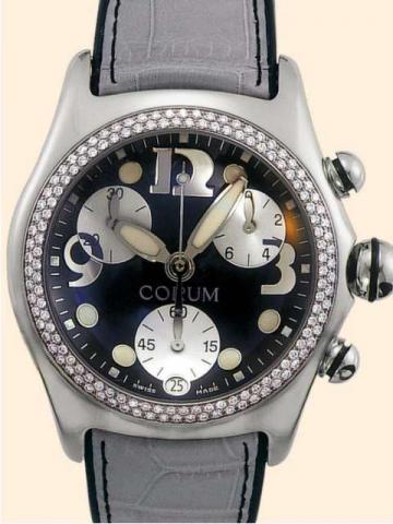 Corum, Boutique, Bubble. Produced in 2001..Fine and atypical, curved, water-resistant, stainless steel and diamonds, unisex quartz wristwatch with round button chronograph, registers and date, a thick domed crystal creating a lens effect, a grey leather s