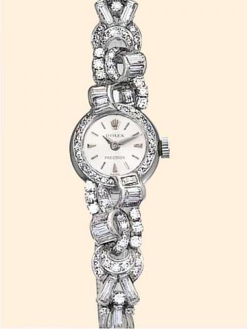 Rolex, Precision , Ref. 8978. Produced in the 1940 's..Fine, Art Deco, 18K white gold and diamonds lady's wristwatch with a polished and brushed 18K white gold double cord bracelet.