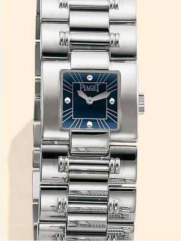 Piaget, Ref. 50010. Pro-duced in 2000..Fine and elegant, rectangular, 18K white gold lady's quartz wristwatch with an 18K white gold Piaget link bra-celet and deployant clasp.