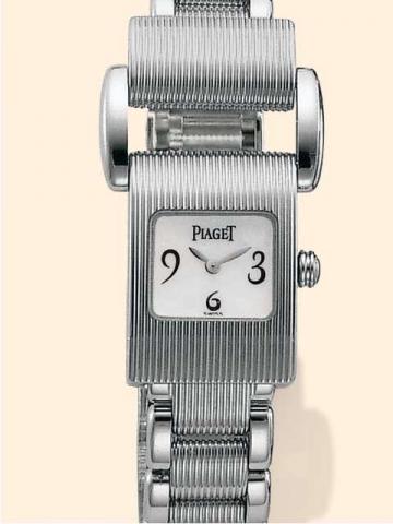 Piaget, Geneve, Miss Protocole, Ref. 5221. Produced in 2001..Fine and unusual, asymmetrical, 18K white gold lady's quartz wristwatch with an articulated Piaget bracelet with ribbed links at the center, po-lished on the sides and an unusual 18K white gold 