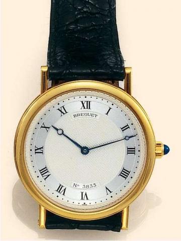 Breguet, Ref. 3390. Produced in the 1990's..Very fine and elegant, thin, self-winding, water-resistant, 18K yellow gold gentleman's wristwatch with an 18K yellow gold Breguet buckle. Accompanied by original box.