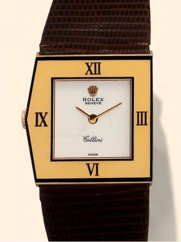 Rolex Cellini. Ref. 4151. Produced in the 1970's. With box..Fine and unusual, asymmetrical, 18K yellow gold gentleman's wrist-watch with a Rolex buckle.