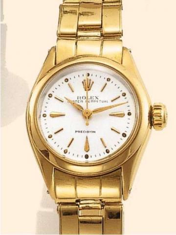Rolex Oyster Perpetual Precision, Ref. 6618. Produced in the 1950's..Fine and rare, center-seconds, self-winding, water-resistant, 18K yellow gold lady's wristwatch with an 18K yellow gold Oyster bracelet.