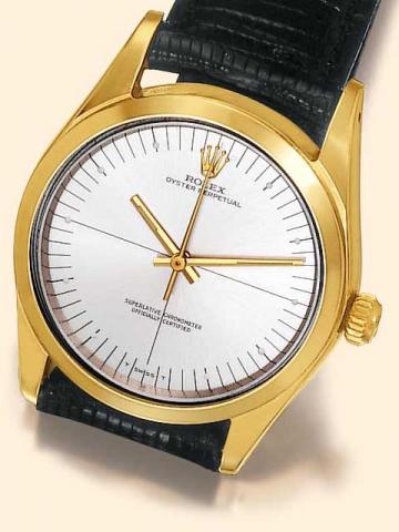 Rolex, Superlative Chronometer Officially Certified, Ref. 1014. Produced in the 1960's.Fine tonneau-shaped, center-seconds, self-winding, water-resistant, stainless steel and gold plated gentleman's wristwatch with a gold-plated Rolex buckle.