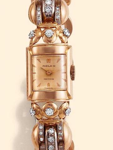 Rolex Precision, Ref. 4613. Produced in the 1940's.Very fine and rare, rectangular curved, bomb_ 18K pink gold and diamond-set lady's wristwatch with an 18K integrated and articulated pink gold and diamond-set bracelet, made of geometrical-shaped links.