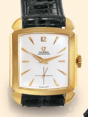 Omega, No. 12853600, case No. 11121300, Ref. 3950. Produced circa 1951.Fine, self-winding, carr_ galb_, 18K yellow gold gentleman's wristwatch with a yellow gold plated Omega buckle.