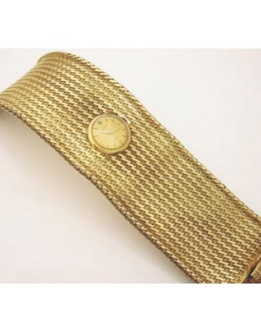 Rolex, Precision, Ref. 2191. Produced in the 1960's. Fine and unusual, 18K yellow gold lady's wristwatch with an integrated, extra-wide and textured 18K yellow gold Swiss made bracelet.