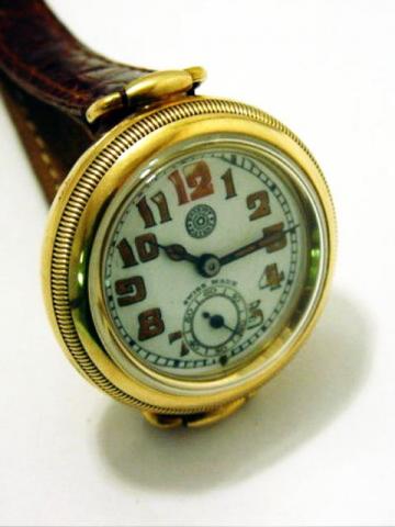 Roskopf, Patent, Swiss Made. Ref. 5178, case No. 50483, circa 1910.Fine and rare, round, early water-resistant, 14K pink gold, mid-sized wristwatch.