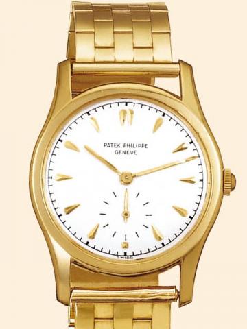 Patek Philippe Cie, Geneve, No. 955074, case No. 657852, Ref. 2464. Production of this reference started in 1950.Fine and very rare, Calatrava-type, 18K yellow gold gentleman's wristwatch with 14K yellow gold tiled bracelet.