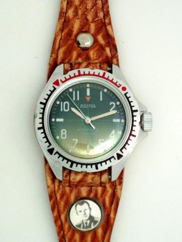 Boctok Antimagnetic, Russian. Produced in the 1970's..Unusual center-seconds, water-resistant, stainless steel diver's wristwatch with a fitted diver's bracelet bearing a portrait-holder under the 6, inside, the picture of a young soldier.