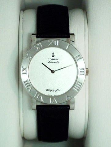 Corum Romulus, Ref. 58.706.59. Produced in the 1990's, sold on January 15, 2003..Fine, self-winding, water-resistant, 18K white gold gentleman's wristwatch with 18K white gold Corum buckle. Accompanied by a fitted box and certificate.