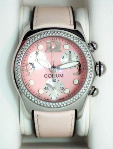 Corum Boutique, Bubble Chronograph, Ref. 396.152.47. Produced in the 1990's, sold on January 15, 2003..Fine and atypical, curved, water-resistant, stainless steel and diamonds, unisex quartz wristwatch with round button chronograph, registers and date, a 