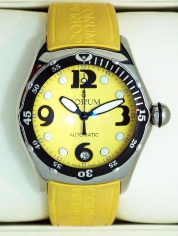 Corum, Bubble - Dive, Ref. 82.180.20. Produced in the 1990's, sold on January 15, 2003..Fine and atypical, curved, center-seconds, self-winding, water-resistant, stainless steel unisex wristwatch with date, 42-hour autonomy, a thick domed crystal creating