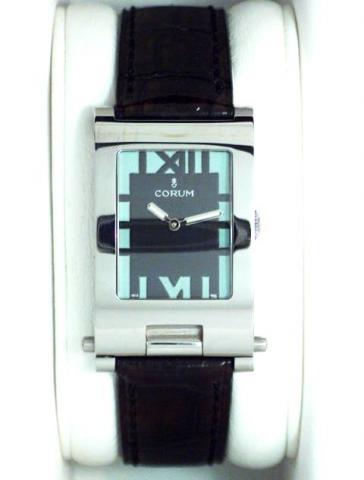 Corum, Tabogan, Ref. 64.151.20. Produced in the 1990's, sold on January 15, 2003..Fine and unusual, water-resistant, asymmetric, rectangular curved, stainless steel quartz gentleman's wristwatch bearing a sliding and hinged mechanism which transforms the 