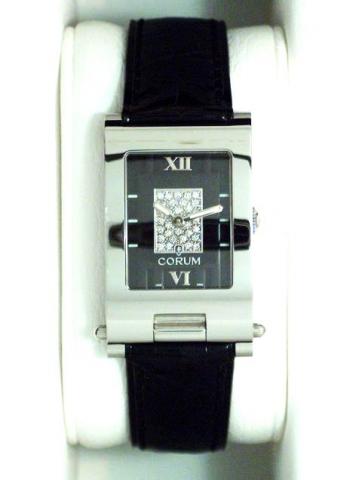 Corum, Tabogan, Ref. 64.151.20. Produced in the 1990's, sold on January 15, 2003..Fine and unusual, water-resistant, asymmetric, rectangular curved, stainless steel and diamonds quartz gentleman's wristwatch bearing a sliding and hinged mechanism which tr