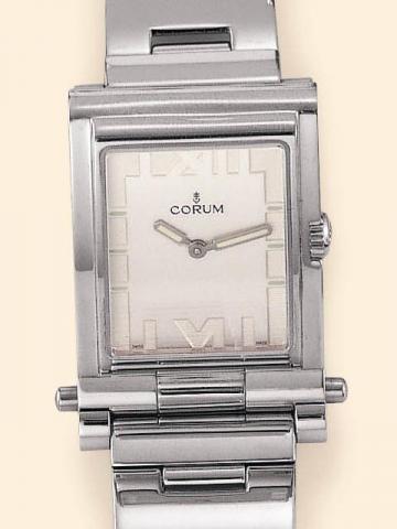 Corum, Tabogan, Ref. 64.151.20. Produced in the 1990's, sold on January 15, 2003.Fine and unusual, water-resistant, asymmetrical, rectangular curved, stainless steel quartz gentleman's wristwatch bearing a sliding and hinged mechanism which transforms the