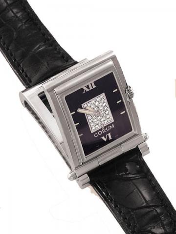 Corum, Tabogan, Ref. 64.151.20. Produced in the 1990's, sold on January 15, 2003.Fine and unusual, water-resistant, asymmetric, rectangular curved, stainless steel and diamonds quartz gentleman's wristwatch bearing a sliding and hinged mechanism which tra