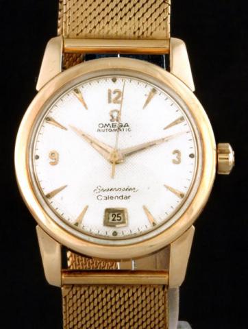 Omega, Seamaster Calendar, Ref. 2757 SC. Produced circa 1954.Fine and rare, center-seconds, self-winding, water-resistant, 18K pink gold gentleman's wristwatch with date and an 18K pink gold Omega linen-textured bracelet and clasp.