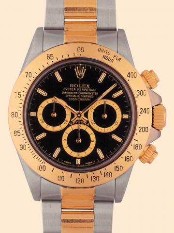 Rolex, Oyster Perpetual, Superlative Chronometer, Officially Certified, Cosmograph Daytona, Ref. 16500. Produced in the late 1990s. Fine, self-winding, water-resistant to 100 m., stainless steel and 18K yellow gold gentleman's wristwatch with round button