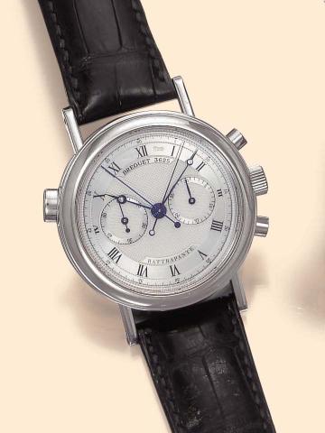 Breguet, Rattrapante, No. 3625, Ref. 3947. Produced in the late 1990's.Very fine and rare, 18K white gold gentleman's wristwatch with round and oval button split-seconds chronograph, registerand an 18K white gold Breguet deployant clasp. Accompanied by fi