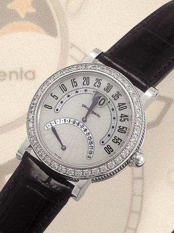 G_rald Genta, Retro Biretro, Ref. G 3754. Produced circa 2000.Fine and unusual, jump-hour, self-winding, water-resistant, 18K white gold and diamond gentleman's wristwatch with retrogrademinutes, retrograde date and an 18K white gold G_rald Genta buckle.