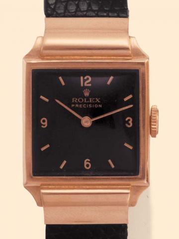 Rolex, Ref. 3893.Produced in the 1930s.Fine, square, 18K pink gold gentleman