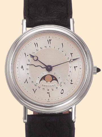 Breguet Serpentine, No. 3583, Ref. 4070. Made in only nine examples with Islamic numerals, in the 1980s. Very fine and unusual, astronomic, self-winding, water-resistant, 18K white gold gentleman's wristwatch with date, phases and age of the moon. Accompa