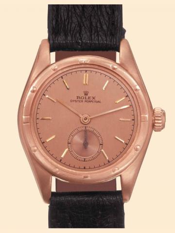 Rolex Oyster Perpetual Chrono-meter, Ref. 3495. Made in the 1950s. Fine and rare tonneau shaped, self-winding, 18K pink gold lady
