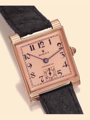 Rolex Chronometer, Ref. 3689. Manufac-tured in the 1940s. Very fine and rare, square, 14K pink gold gen-tleman