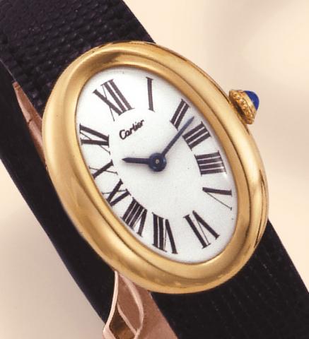 Cartier London,Baignoire, No. 10498, Ref. 7994. Produced in the 1980s. Very fine, oval and curved, 18K yellow gold lady's wristwatch with an 18K pink gold Cartier deployant clasp.