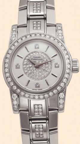 Girard-Perregaux, Lady F, Automatic, Ref. 8038. Produced circa 2000. Fine, self-winding, water-resistant, stainless steel and diamond lady's wristwatch with a stainless steel Girard-Perregaux link bracelet and deployant clasp. Accompanied by a fitted box 