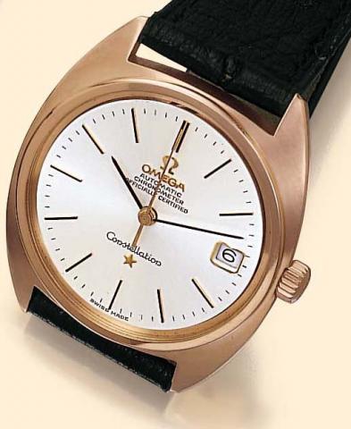 Omega, Automatic Chronometer, Officially Certified Constellation, Ref. 168009. Produced in the 1970s. Production of the Constellation started in 1952. Very fine, tonneau-shaped, center-seconds, self-winding, water-resistant, 18K pink gold gentleman's wris
