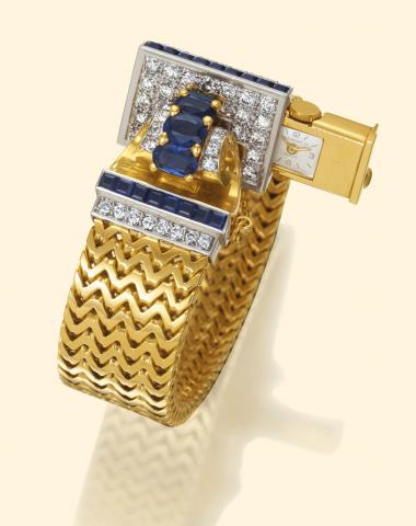 Patek Philippe Cie, Geneve, No. 842390, case No. 509111, Ref. 2126. Produced in 1945, sold on February 3, 1946. Exceptionaly fine and extremely rare, asymmetric, 18K yellow gold, platinum, sapphire and diamond lady's wristwatch 