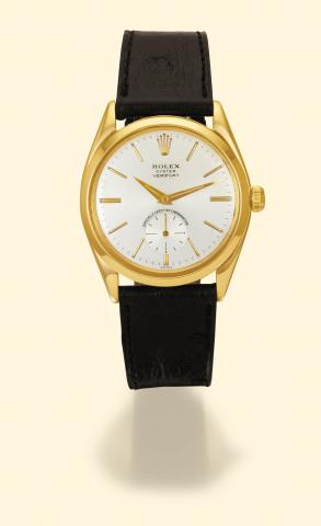 Rolex Oyster Veriflat, Officially Certified Chronometer, Ref. 6512. Sold on August 15, 1958. Fine and rare, thin, water-resistant, 18K yellow gold gentleman's wristwatch. Accompanied by original certificate, and Bulletin de marche.
