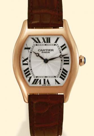 Cartier, Paris, Private Collection, Ref. 2498 E. Produced in the late 1990s. Fine, tonneau-shaped and curved, 18K pink gold gentleman's wristwatch with an 18K pink gold Cartier buckle. Accompanied by a fitted box and certificate.