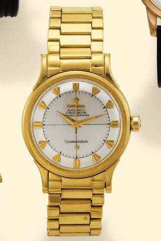 Omega, Constellation, Automatic Chronometer, Officially Certified, Ref. 2782-2799 SC. Production of this model started in 1952. Fine, center-seconds, self-winding, water-resistant, 18K yellow gold gentleman's wristwatch with an 18K yellow gold Omega link 