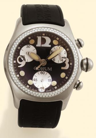 Corum Boutique, Bubble Chronograph, Ref. 396. 150.20. Produced in the 1990s. Fine and atypical, curved, water-resistant, stainless steel and diamond, unisex quartz wristwatch with round button chronograph, registers and date, a thick domed crystal creatin