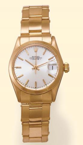 Rolex, Oyster Perpetual Date, Ref. 6624. Produced in the early 1960s. Fine, center-seconds, self-winding, water-resistant, 18K pink gold mid-sized wristwatch with date and an 18K pink gold Oyster bracelet.