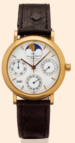 International Watch Co., Schaffhausen, Portofino Perpetuel, Ref. 3541. No. 2471399. Made in the 1990s. Fine, astronomic, center-seconds, self-winding, water-resis-tant, 18K yellow gold gentleman's wristwatch with perpetual calendar, moon phases and an 18K