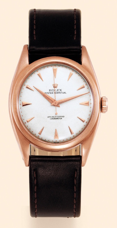 Rolex, Oyster Perpetual, Officially Certified Chro-nometer, Ref. 6088. Ma-de in the 1950s. Fine, center-seconds, self-winding, water-resistant, 18K pink gold gentle-man's wristwatch.