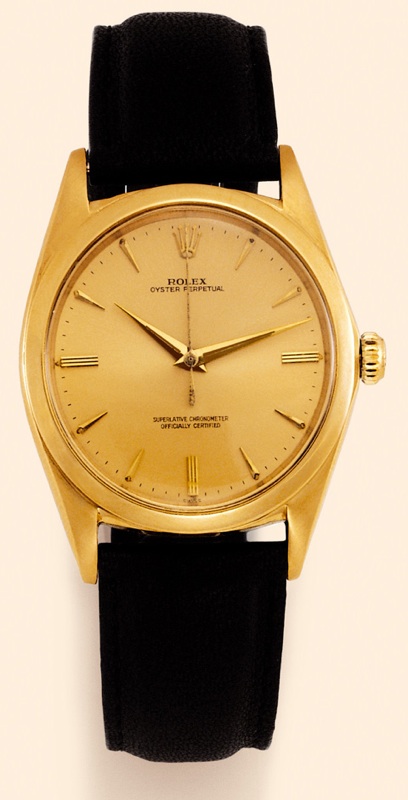 Rolex, Oyster Perpetual, Superlative Chronome-ter, Officially Certified, Ref. 1012. Made in the late 1950s. Fine and rare, tonneau-shaped, center-seconds, self-winding, water-resistant, 18K yellow gold gentleman's wrist-watch with a Rolex buckle.