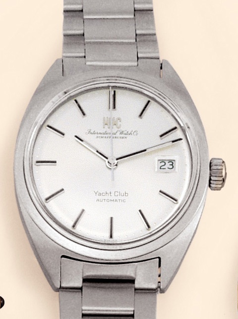 International Watch Co., Schaffhausen, Yacht Club Automatic, Ref. R 811 AD. Made in the 1980s. Fine, tonneau-shaped, center- seconds, self-winding, water-resistant, stainless steel gentleman's wristwatch with date and a stainless steel IWC link bracelet.