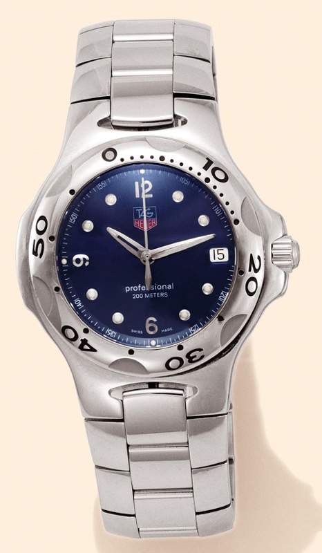 Tag Heuer, Kirium Series, Professional, Ref. 1116-0. Made circa 2002. Fine, water resistant to 200m, quartz, stainless steel wristwatch with center seconds, calendar and stainless steel Tag Heuer bracelet with deployant clasp. Accompanied by a Tag Heuer b