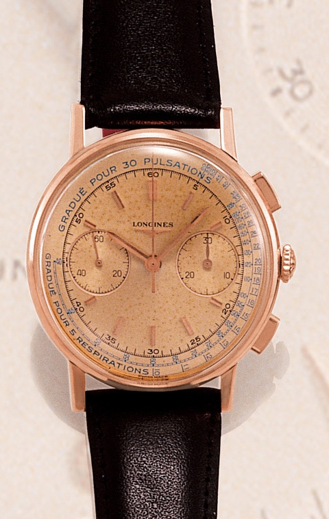 Medical Chronograph Longines, No. 12608515, Ref. 7414. Made circa 1960. Fine, large, 18K pink gold gentleman's wristwatch with square button chronograph, register, pulsometer and pink Longines buckle.