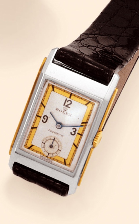 Precision Rolex, Precision, Ref. 2417. Produced in the 1930s. Fine and elegant, rectangular curved, stainless steel and yellow gold gentleman's wristwatch with a sterling silver Rolex buckle.