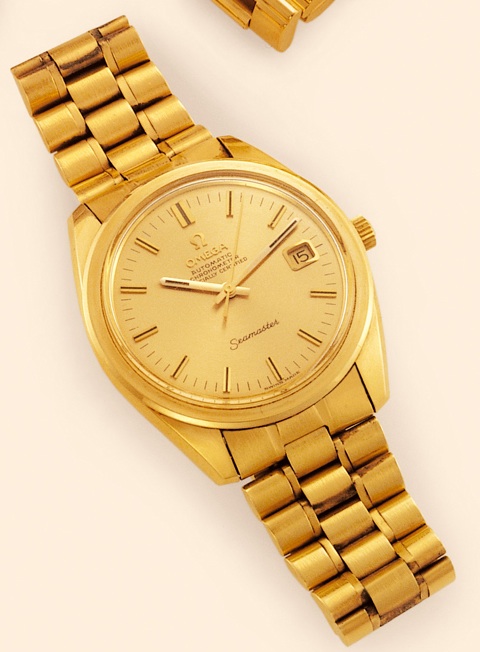 Seamaster Automatic Omega, Seamaster Automatic, Chronometer, Officially Certified, Ref. 168022-67. Made in the 1970s. Very fine, tonneau-shaped, center-seconds, self-winding, water-resistant, 18K yellow gold gentleman's wristwatch with date and an 18K yel