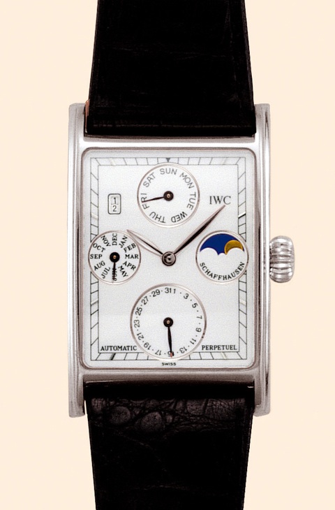 Novecento International Watch Co., Schaffhausen, Novecento Automatic Perpetual, No. 228, Ref. 3546. Made in the 1990s. Fine, rectangular, astronomic, selfwinding, water-resistant, platinum gentleman's wristwatch with secular perpetual calendar, moon phase